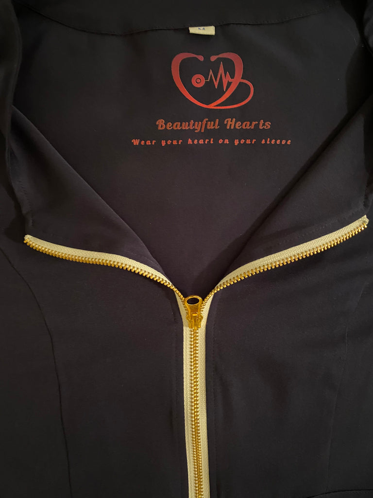 Beautyful Hearts Apparel. Soft, comfortable, stylish sets.  Unique zipper design, signature heart on left sleeve.  Plenty of zippers and pockets. Jogger-style pants provide lift and support to enhance your unique figure.  For healthcare, daycare, spas, lash techs, cosmetologist and everyone else.  Wear your heart on your sleeve!